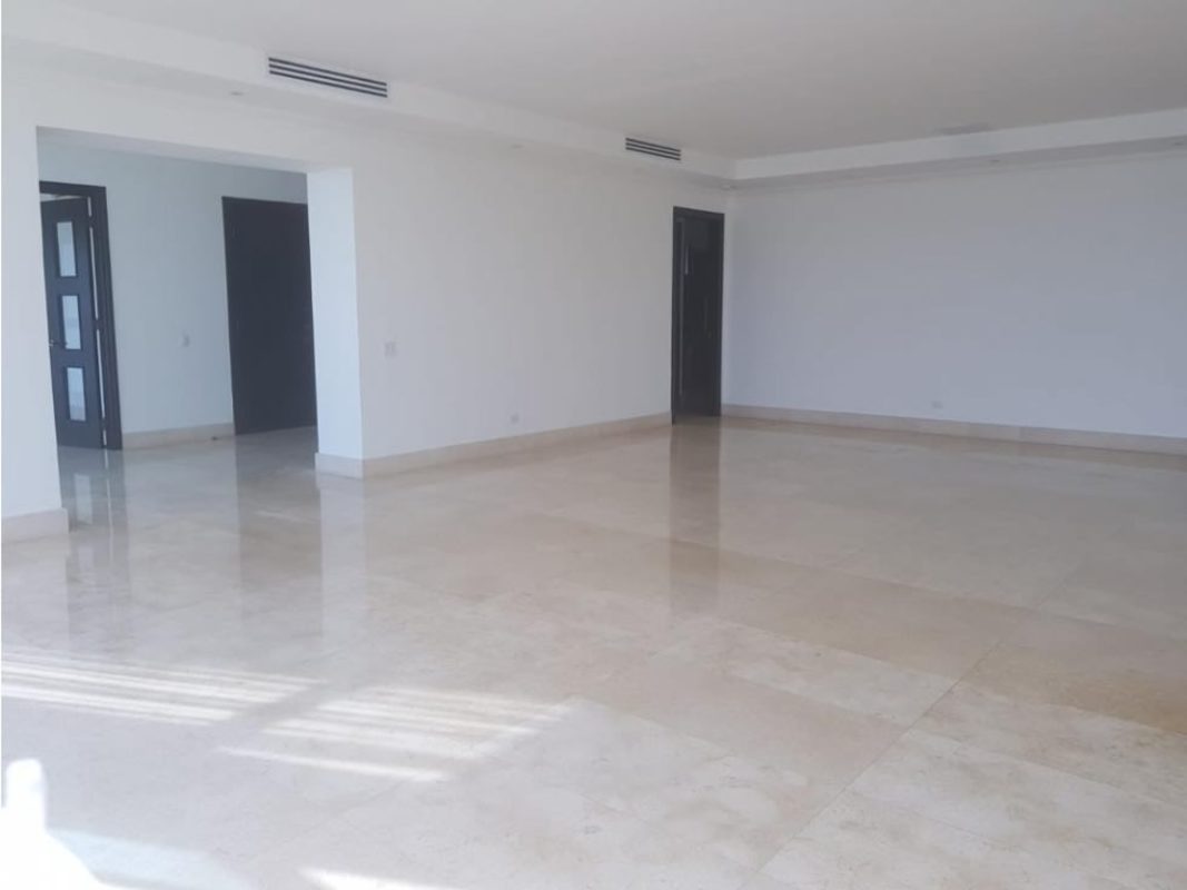 Minimalist living room with marble floors and full ocean view windows in PH Ten Tower Costa del Este