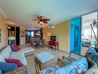 Large balcony with outdoor dining set, ocean and pool view Playa Blanca Panama