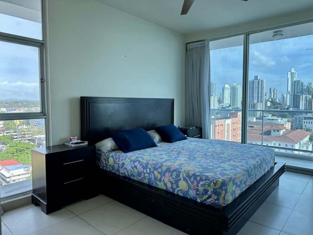 Master bedroom featuring large windows, ocean and city view, closet in PH Destiny Tower Avenida Balboa Panama City