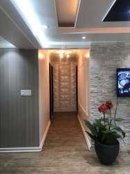 Hallway with recessed lighting, accent lighting, potted plant decor, PH Silver City Colón Panama