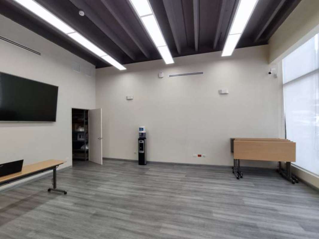 Spacious conference training room with TV and modern furnishings commercial property Vía España Panama City