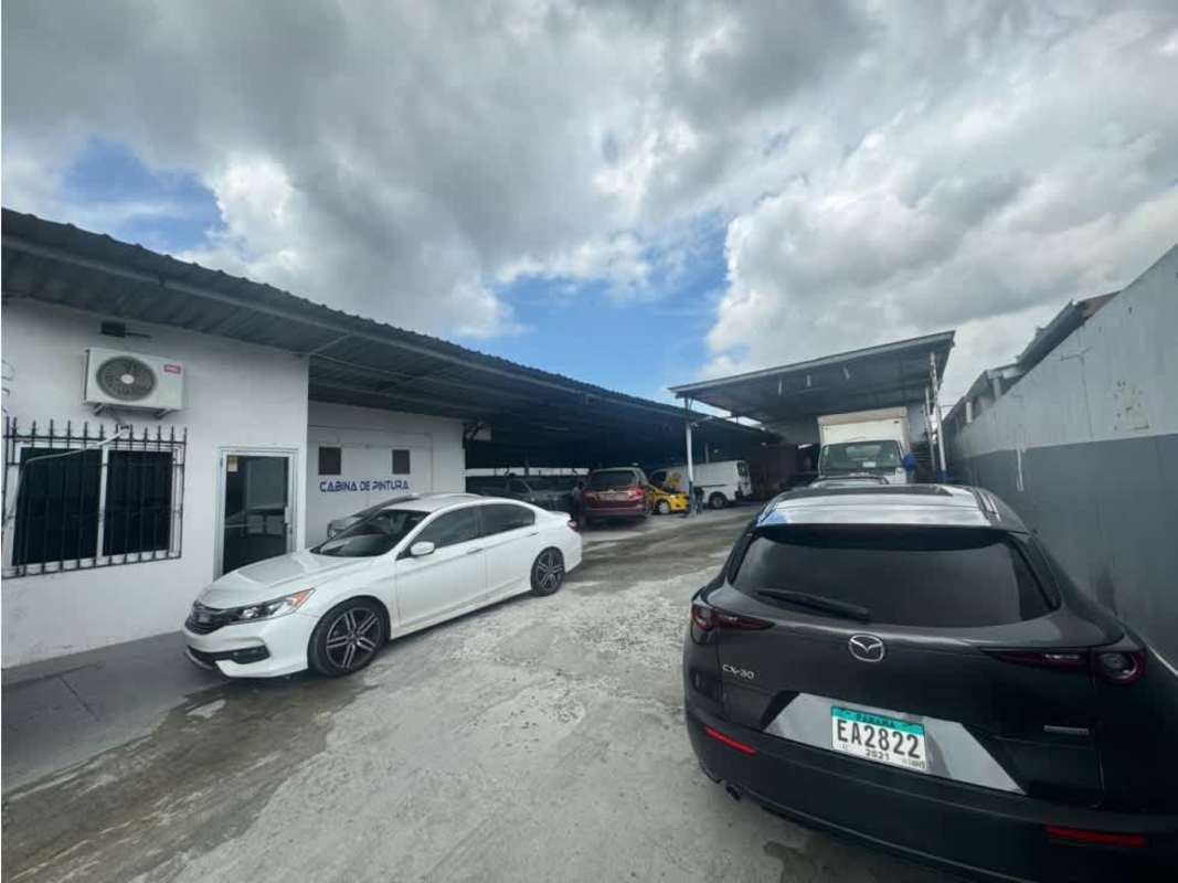 Functional workspace with desks and AC inside Llano Bonito industrial warehouse Panama