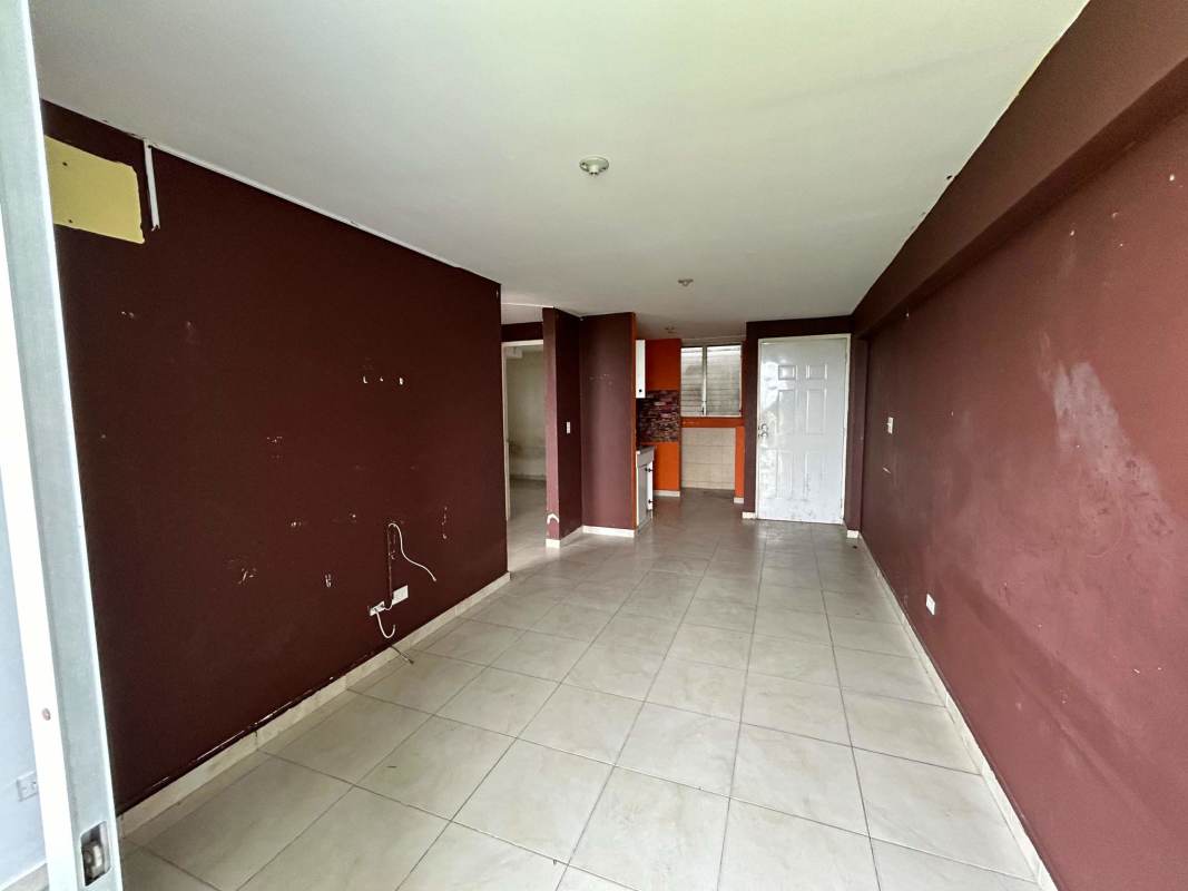 Living/dining room with open kitchen affordable apartment PH Mystic Blue Juan Díaz