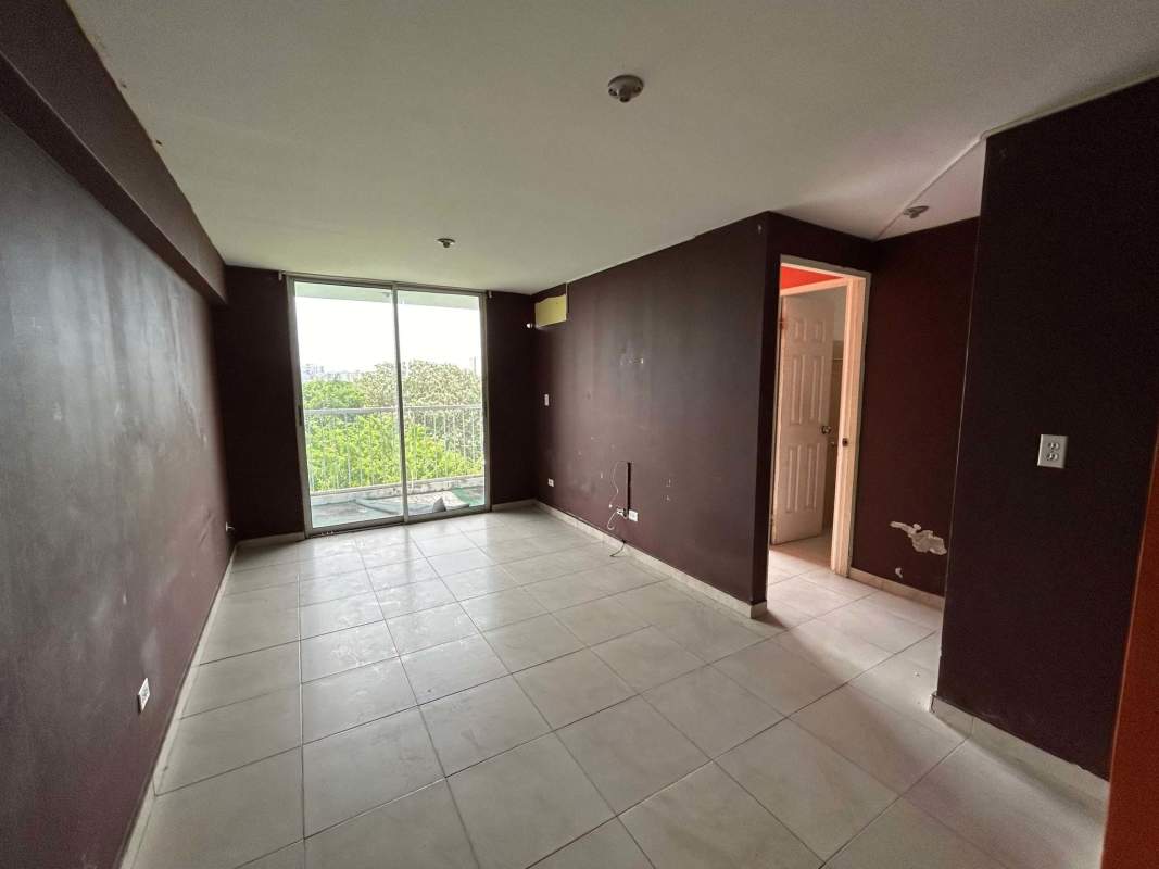 Living room with sliding door to balcony PH Mystic Blue Juan Díaz Panama