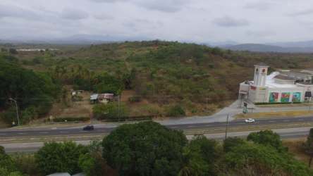 Aerial view of 19 hectare flat land lot adjacent to Plaza Terrazas de Coronado along Interamericana Highway