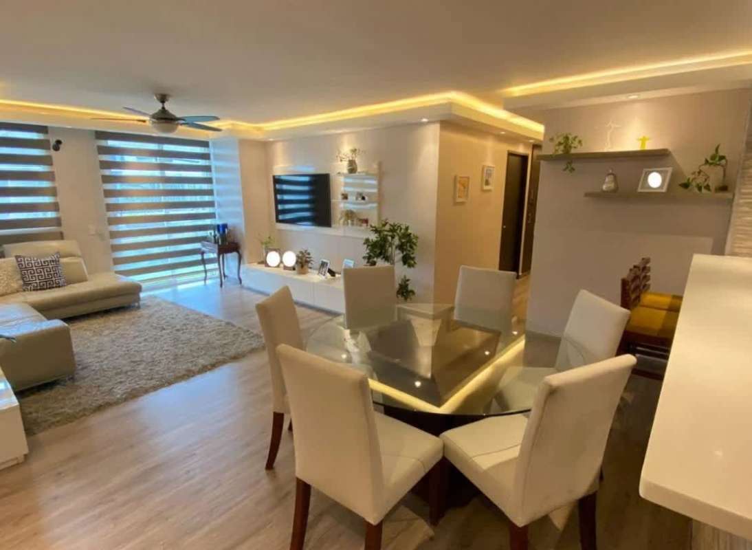 Contemporary kitchen with white cabinetry and granite countertops in PH Obarrio Central Panama