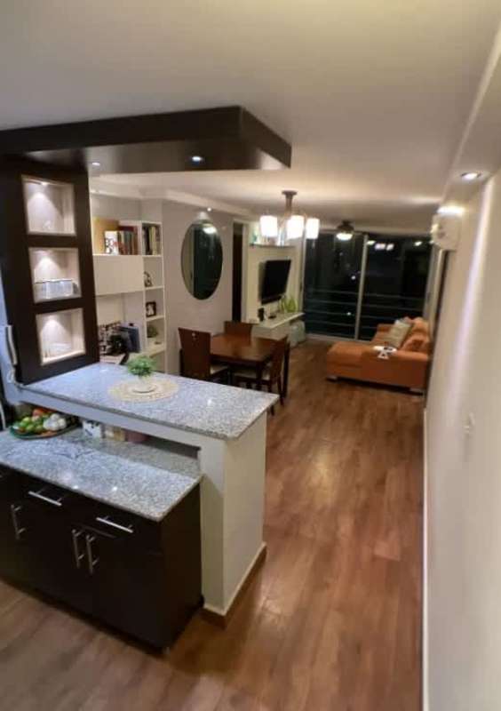 Spacious open living dining and kitchen area with large windows, granite breakfast bar in PH Arena's Park Panama