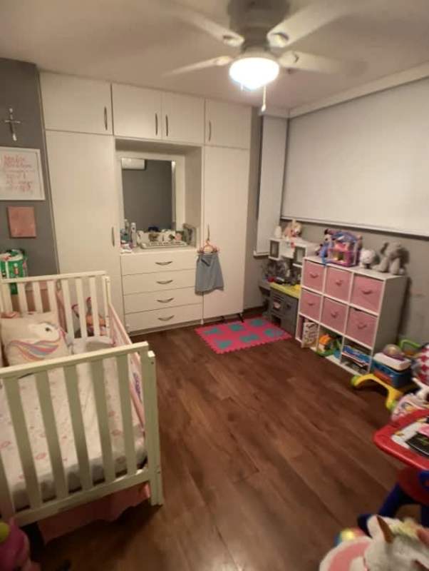 Nursery bedroom with crib, wardrobe mirror and wood floor Arena's Park Parque Lefevre