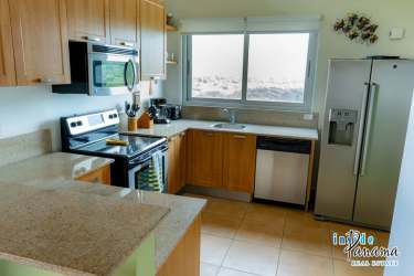 Fully equipped kitchen with granite countertops and stainless appliances