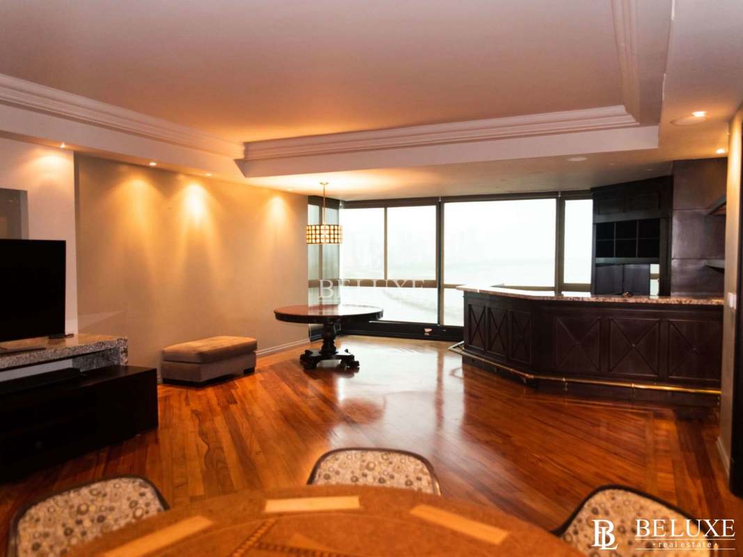 Open-concept living dining space with ocean skyline views PH Panamar Panama