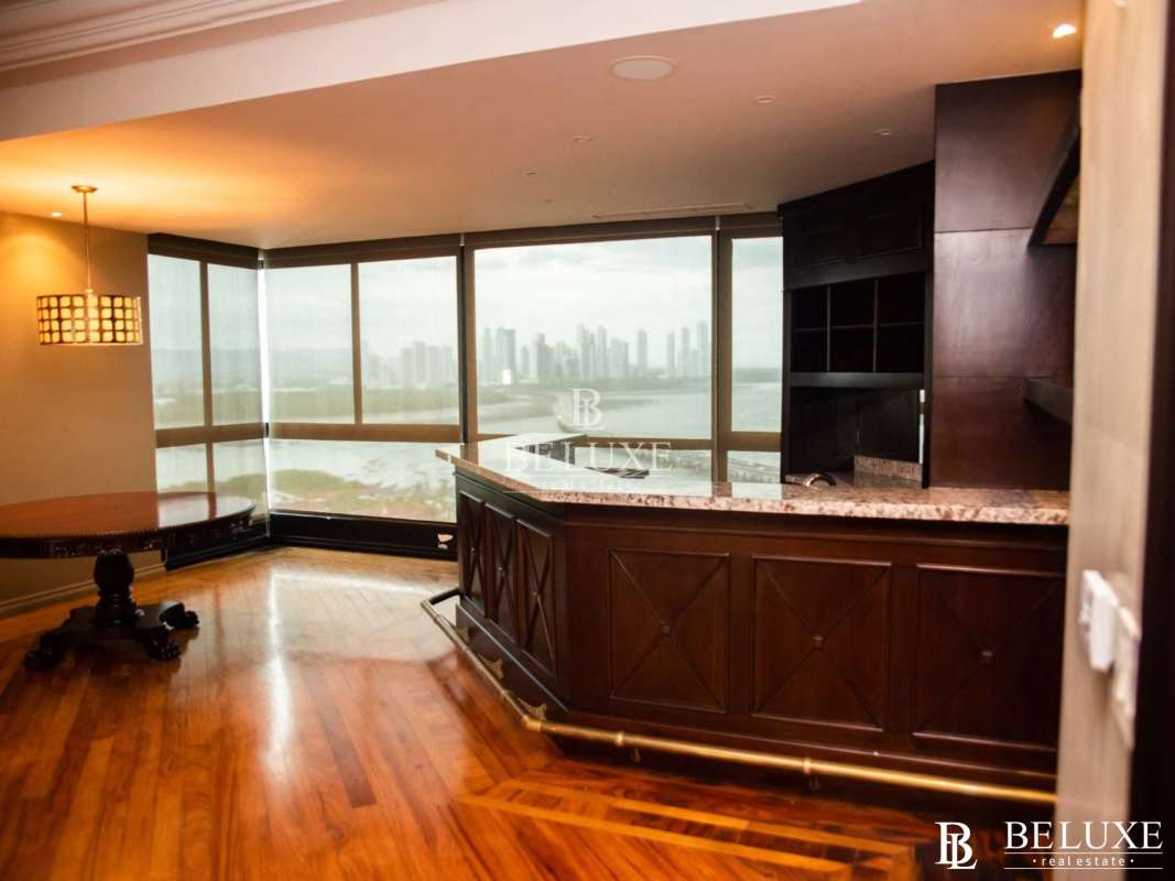 Large formal dining area with marble floors and view at PH Panamar Coco del Mar Panama