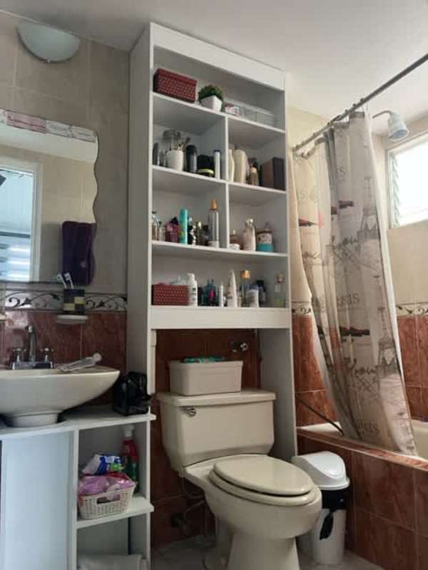 Spacious bedroom featuring large secured window, AC unit, ceiling fan Urbanización Limajo Panama