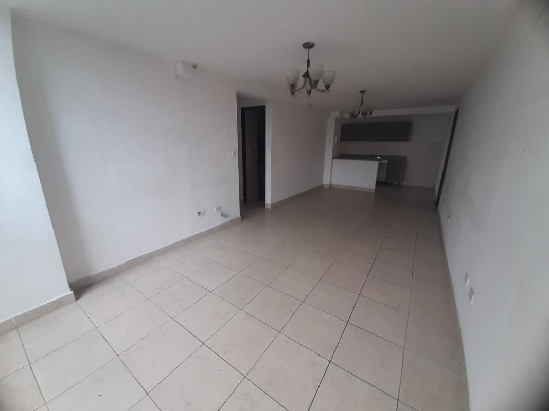 Contemporary open living room with kitchen, tiled flooring, neutral colors in PH Vista Marina Tower Panama