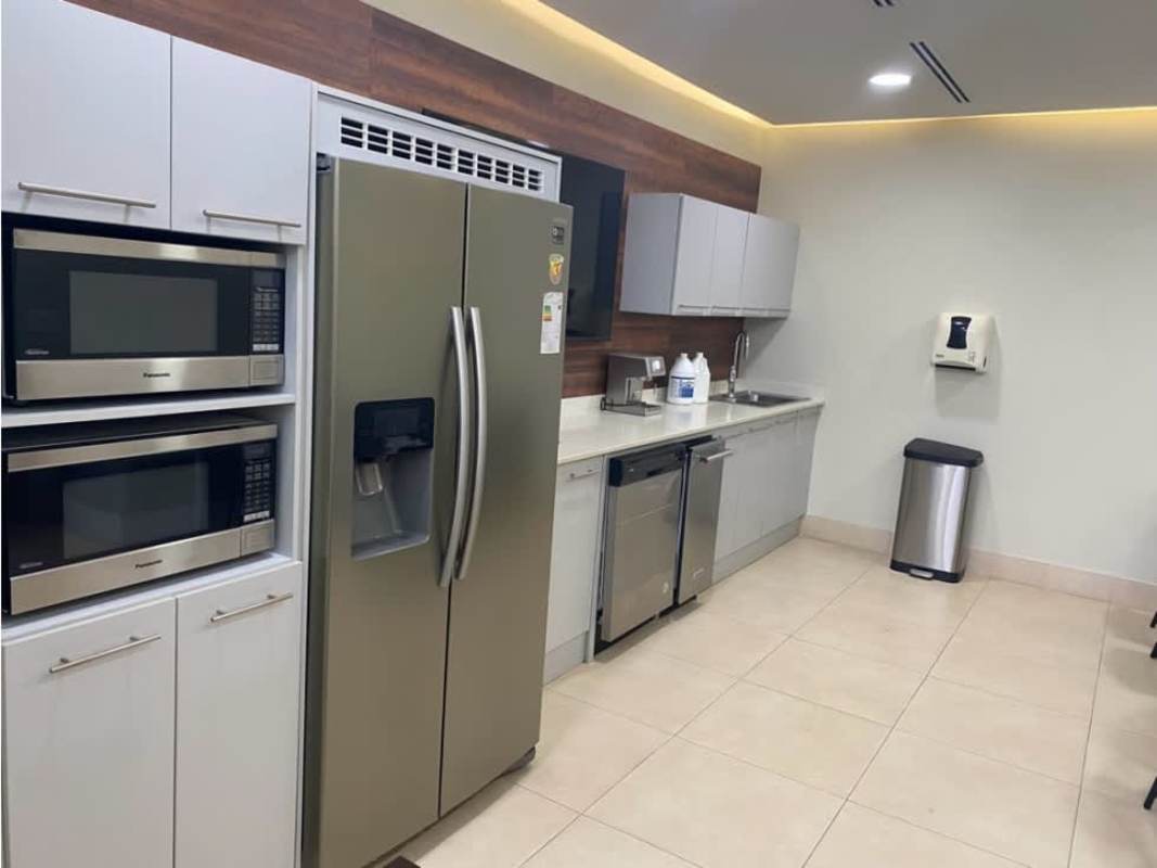 Business office kitchen two microwaves refrigerator appliances in Panama City