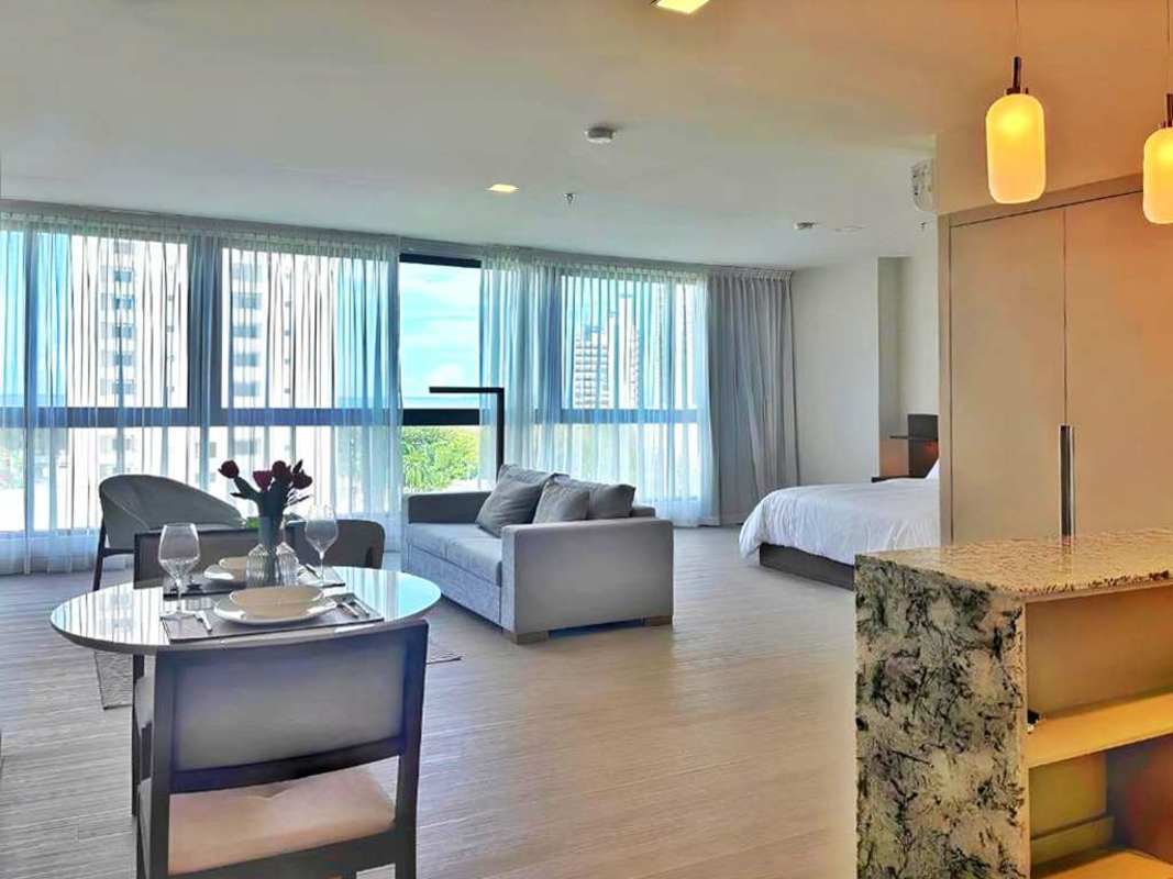 Luxury modern bathroom with walk-in glass shower and floating vanity at PH Arcadia Costa del Este Panama