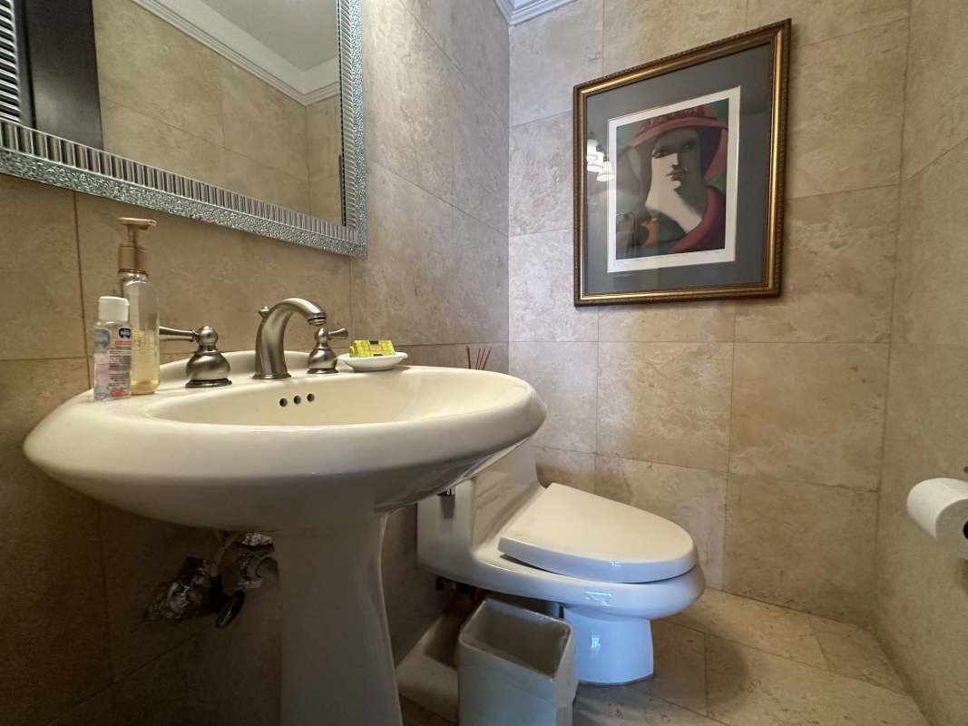 Bedroom with large window, AC, wood flooring, chandelier PH Panama Bay Tower Costa del Este Panama