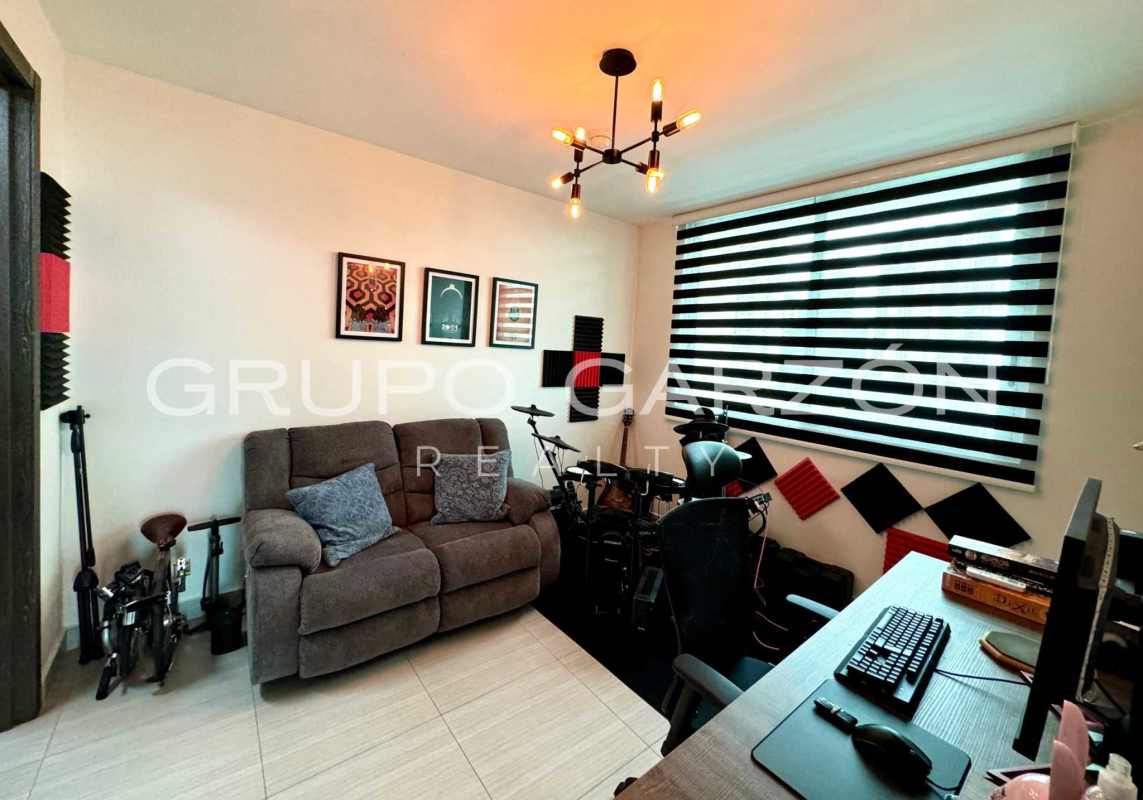 Contemporary kitchen with granite counters and window view at PH Asia Costa del Este Panama