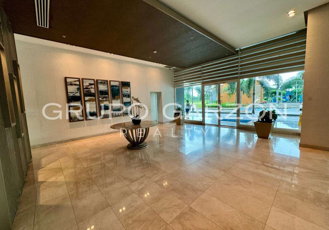 Modern twin high-rise PH Asia with balconies and ocean side view in Costa del Este Panama