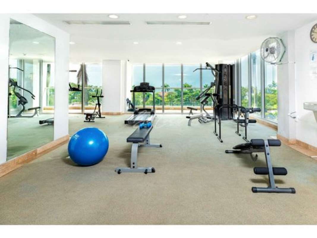 Infinity-edge pool with jacuzzi on rooftop deck PH Rivage Panama overlooking ocean