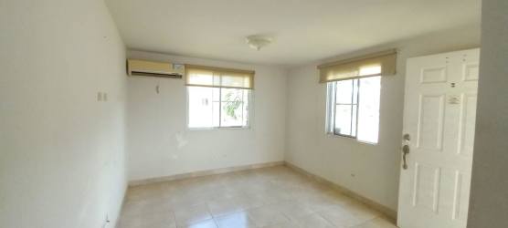 Compact kitchen with granite countertop brown cabinets double sink in PH Las Olas Playa Dorada Vacamonte Panama