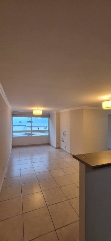 Kitchen with granite tops, cabinets, appliances in PH Prisma Parque Lefevre Panama