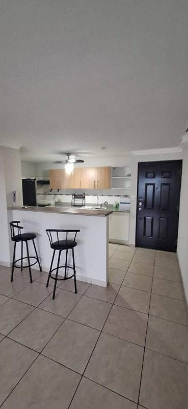 Second bedroom with large window and closet PH Prisma Parque Lefevre Panama