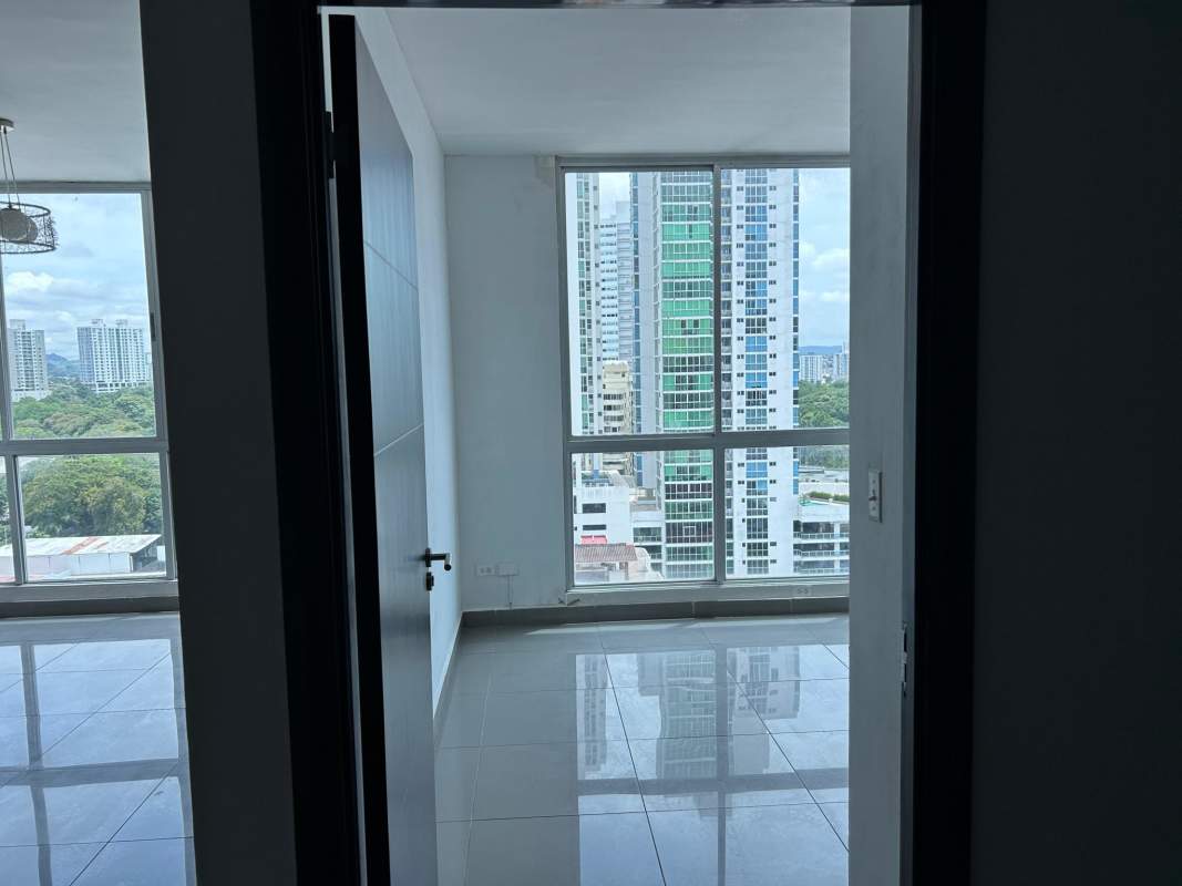 Bedroom view with skyline window at PH Quartier San Francisco Panama