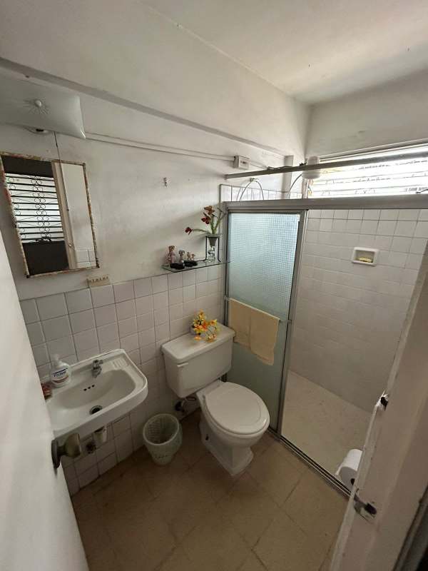 Bathroom with tile, shower enclosure, vanity sink Chanis Panama