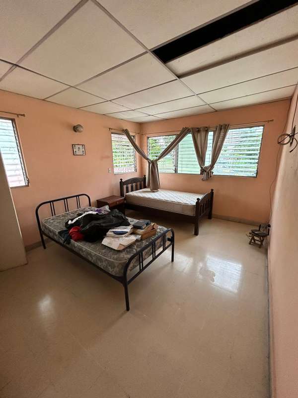 Bedroom with windows and tiled floor traditional style Chanis Panama