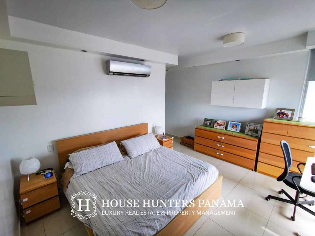 Contemporary kitchen granite countertops and wood cabinets at PH Keops Tower Panama