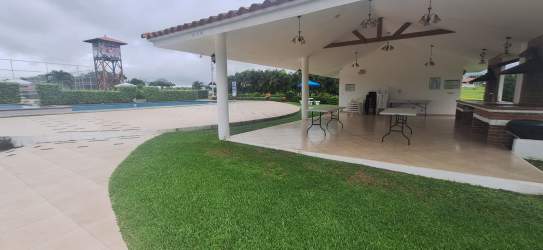 Full size tennis court within PH El Valle Village community in San Carlos Panama