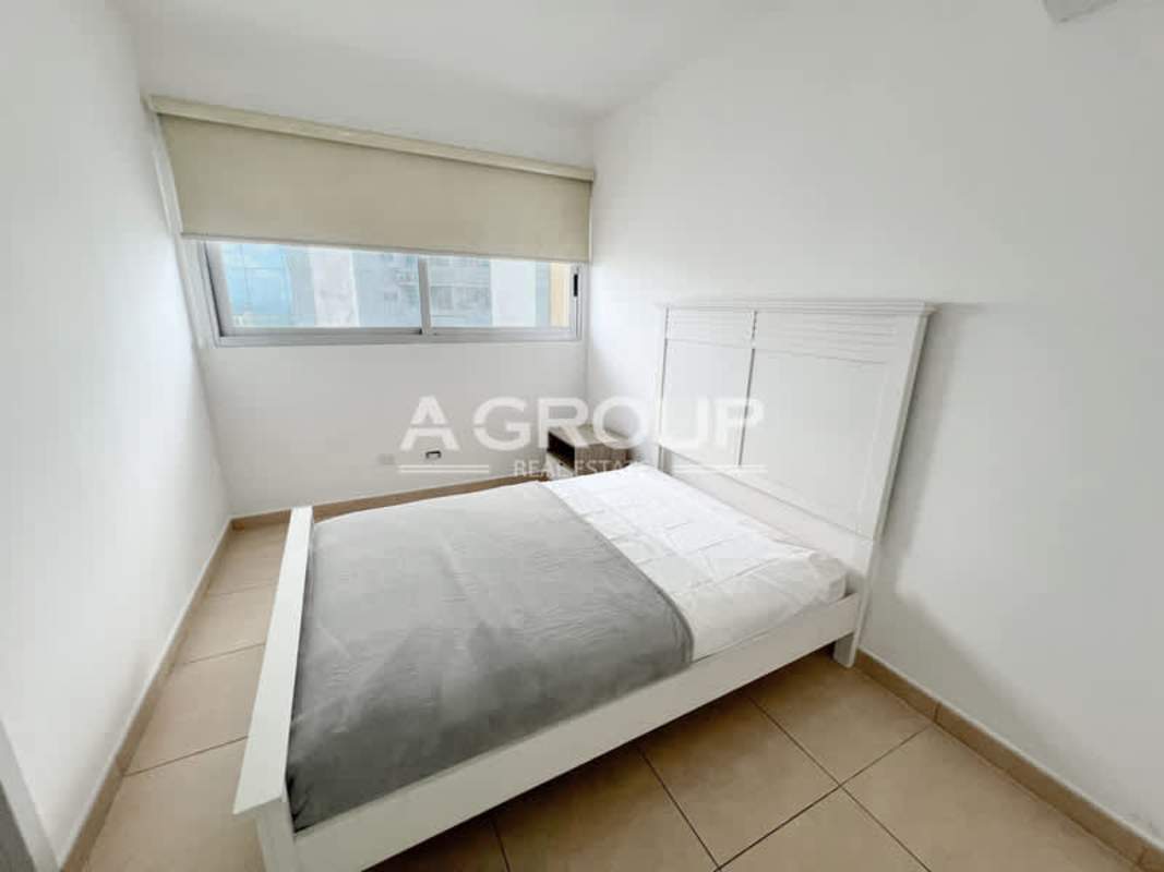 Bright open kitchen with breakfast bar and appliances at Waters on the Bay Panama