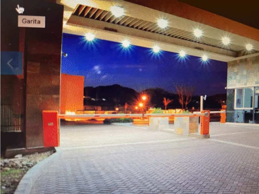 Night view secure gated entrance with lighting PH Country Club Condado del Rey Panama City