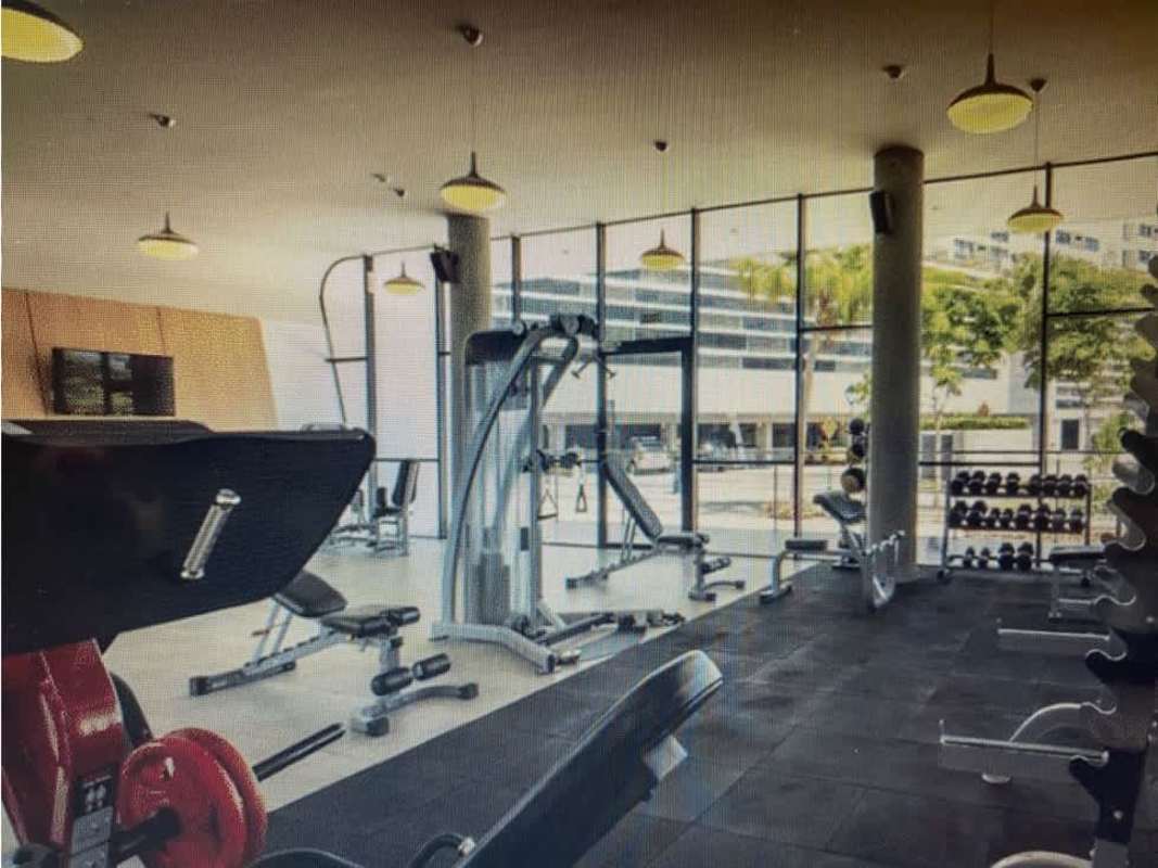 Fitness center with windows, weight equipment at PH Country Club Panama City