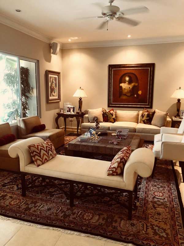 Spacious modern kitchen with granite countertops and white cabinets Costa del Este