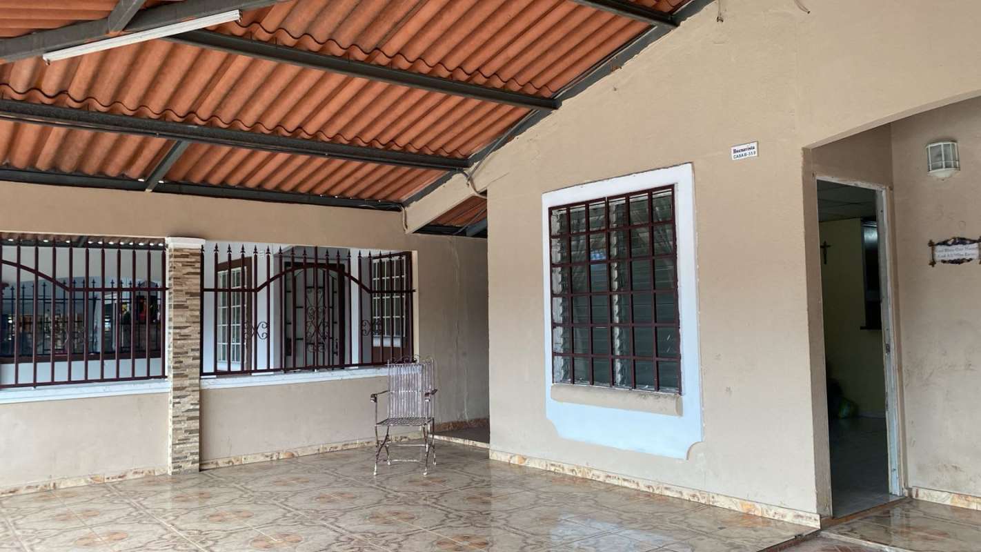 Covered patio with metal roof, tiled floor in backyard Tocumen Panama