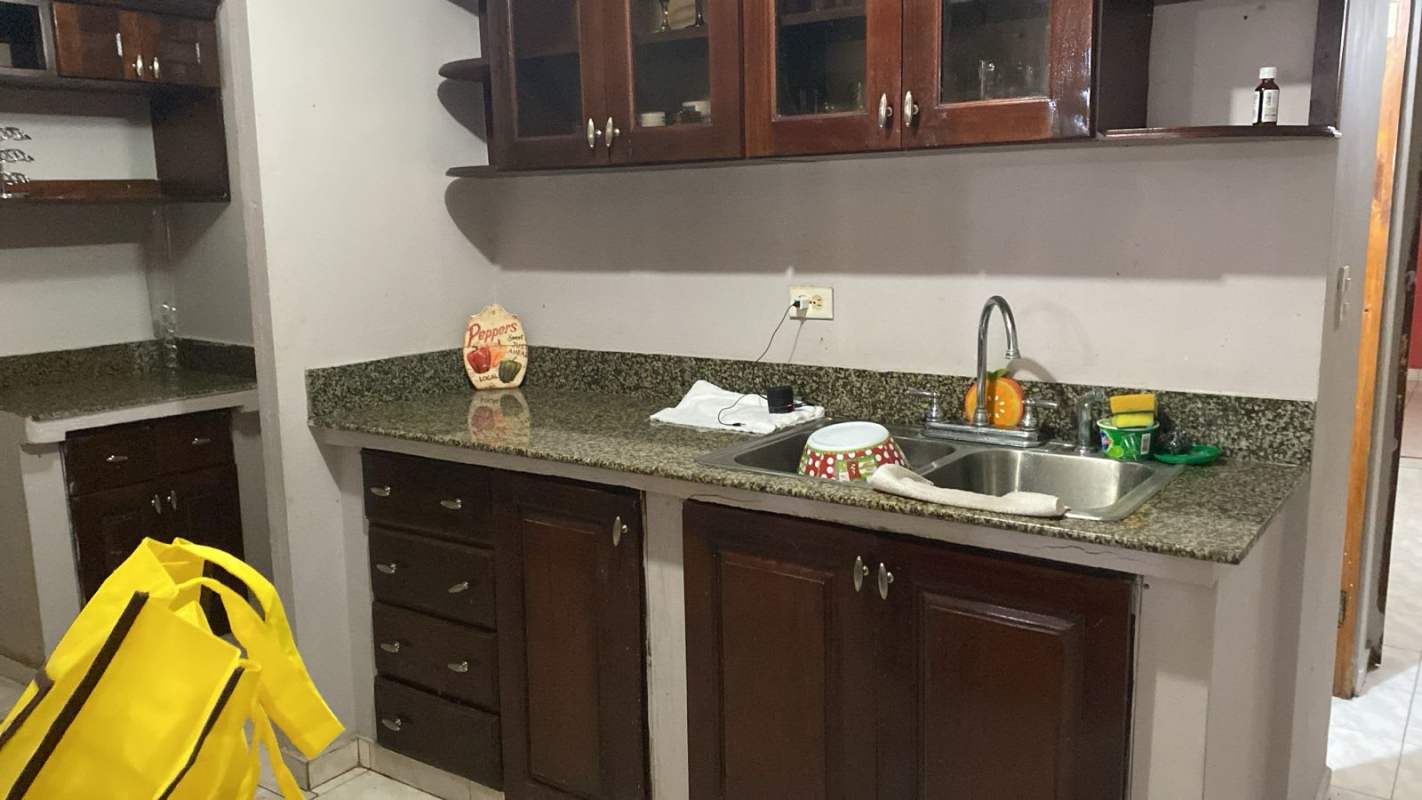 Close-up of traditional kitchen granite counters, cabinets Buena Vista Tocumen Panama