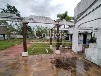 Brick walls, wooden beams and tiled patio in rural land for development in Penonomé Coclé Panama