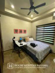 Covered terrace with mountain views, tiled floor in furnished Boquete Canyon Village home Panama