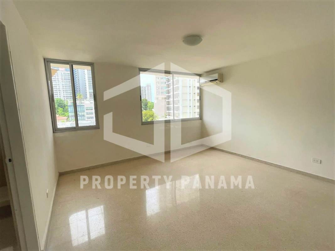 Bathroom with brown wall tiles, vanity, and walk-in shower at PH Savoy Punta Paitilla Panama