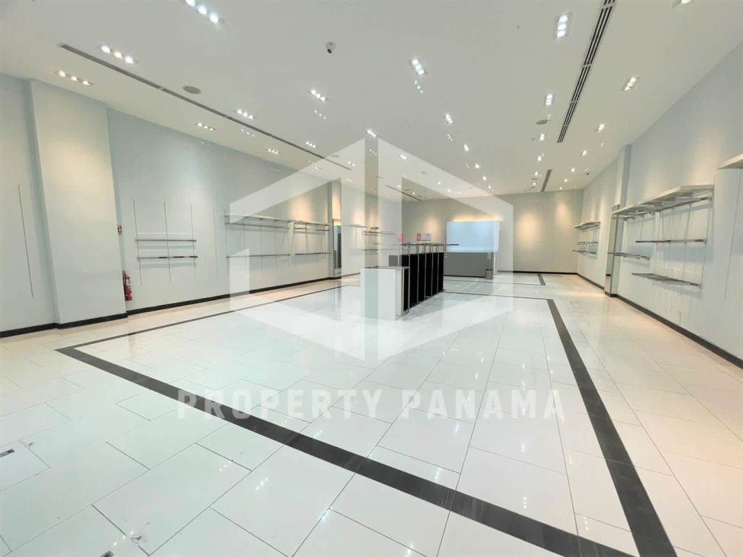 Bright empty retail space with display counters, tile flooring and lighting in Albrook Mall commercial unit Panama City