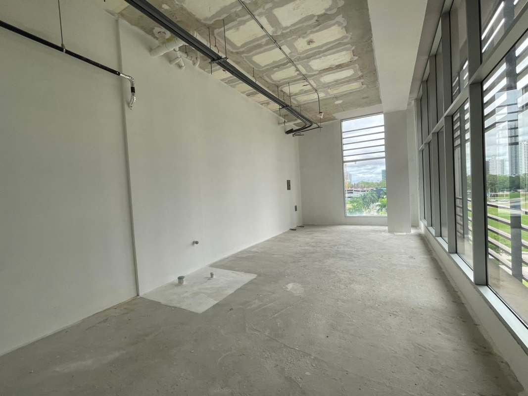 Lobby common area with modern sofas, windows and decor in Town Center Costa del Este in Panama City