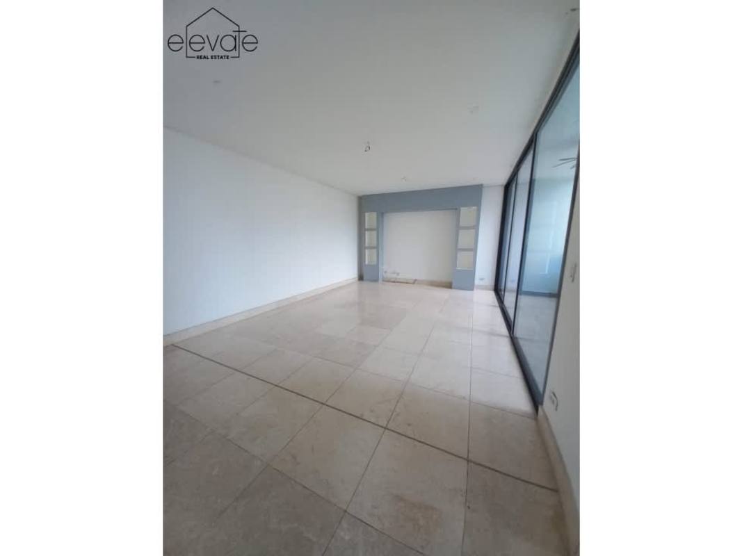 Bright master bedroom with large window, city skyline view Punta Paitilla Panama