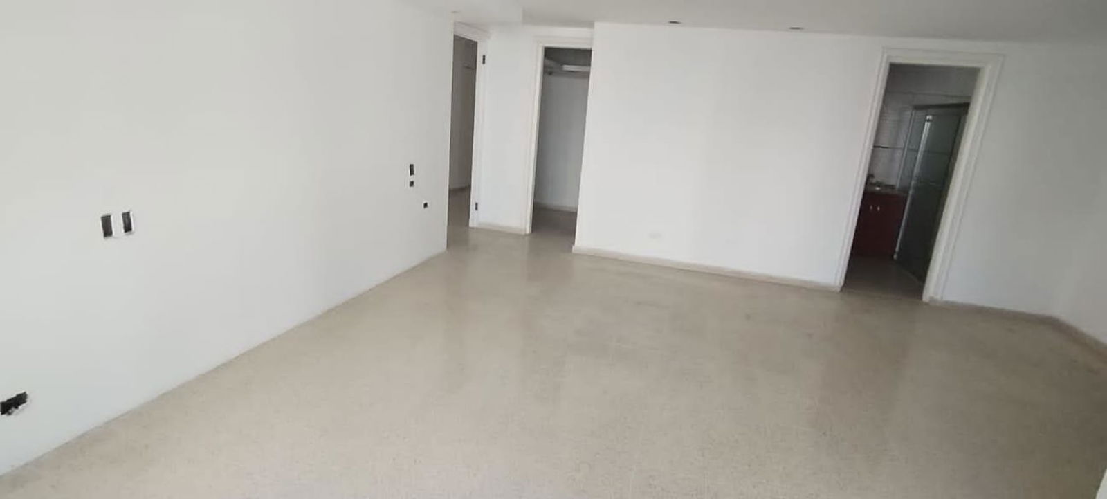 View from inside Punta Paitilla condo overlooking skyline and ocean waters