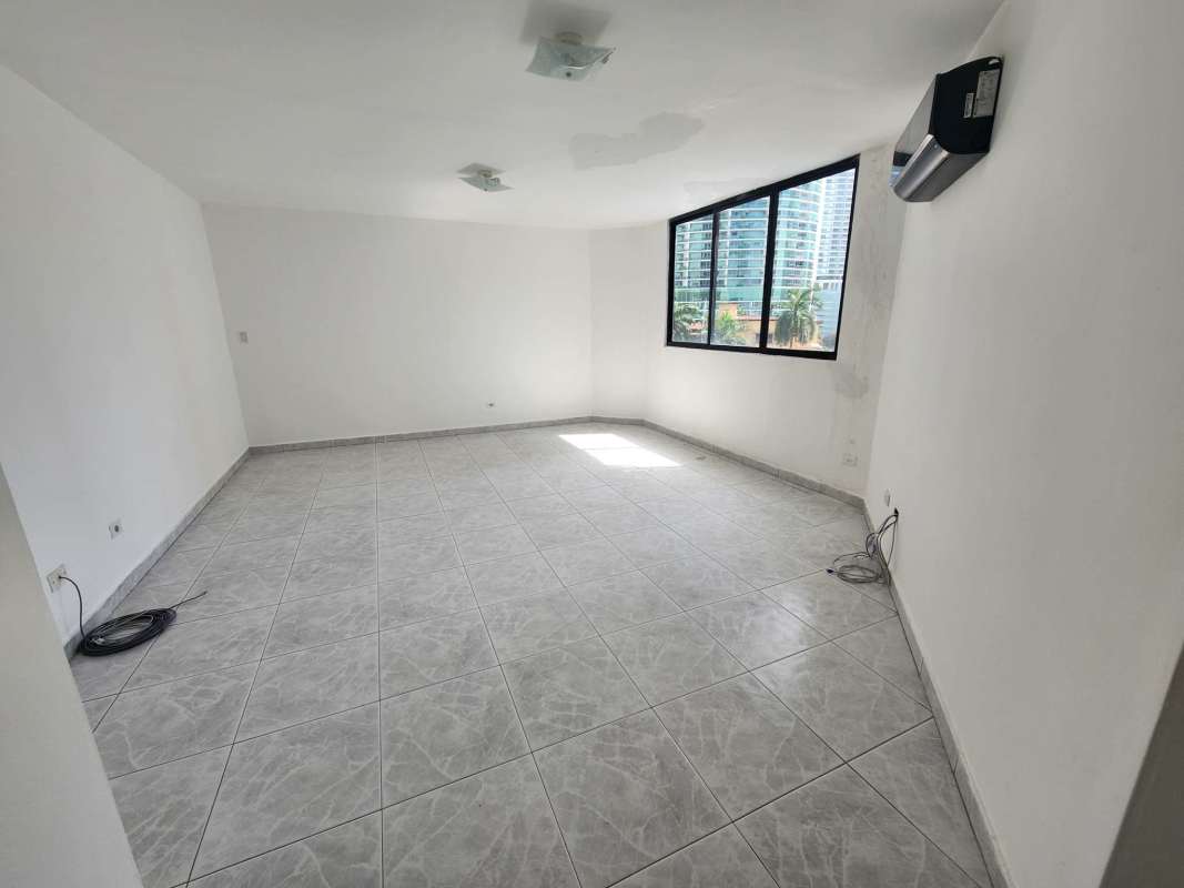 Spacious bedroom with ocean view window, built-in closet, AC in PH Miramar Panama City