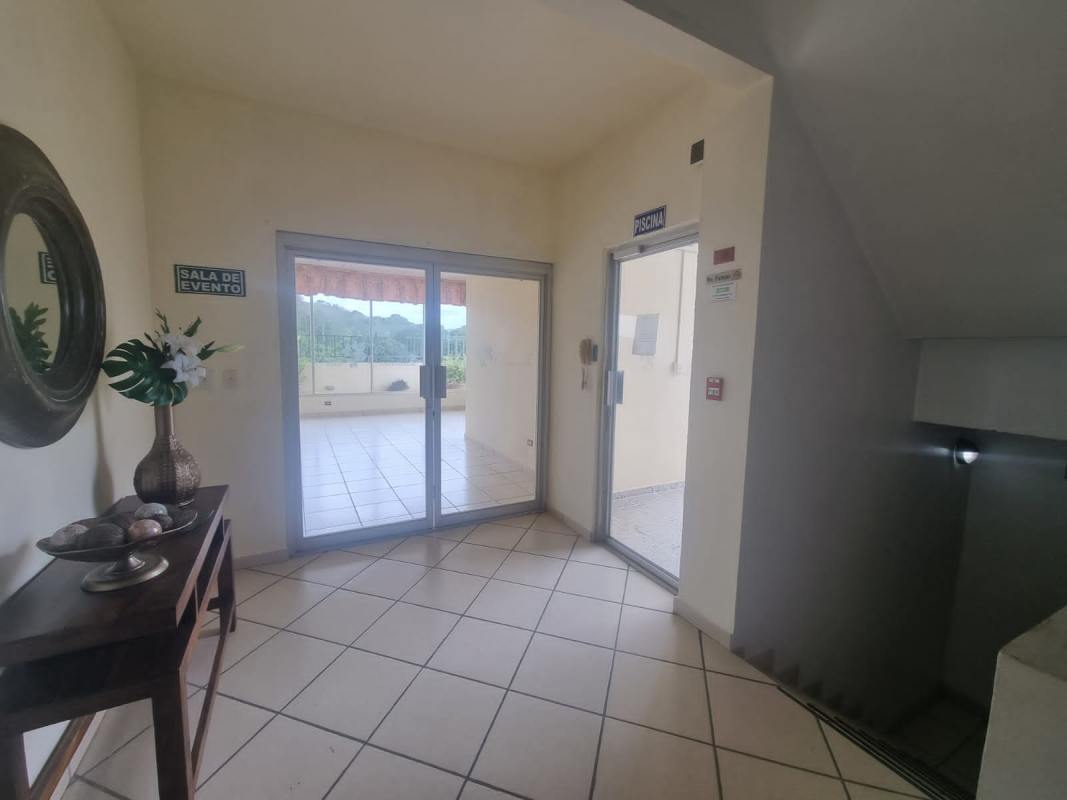 Functional kitchen with appliances and laundry space in PH Vista Esmeralda La Locería Panama