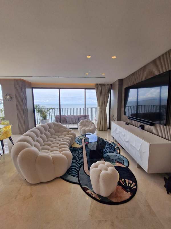 Elegant master bedroom with private balcony, ocean sunrise view, luxury finishes at Seascape Panama