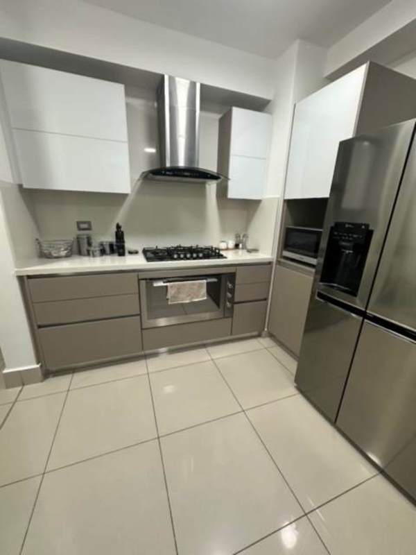 Rooftop infinity pool with ocean and skyline views at PH Bali in Costa del Este Panama