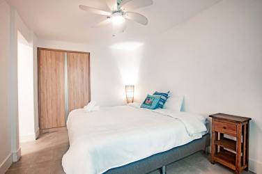 Guest bedroom with bunk bed full plus twin size, large window, air conditioning at Playa Venao