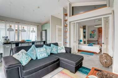 Green exterior villa, covered patio, hammock, garden view at Blue Venao Playa Venao Panama